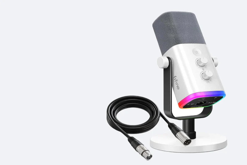 Professional white desktop gaming microphone with vibrant RGB ring lighting on a shock mount. A high-quality condenser mic designed for streaming, podcasting, and clear voice communication in a modern gaming setup.