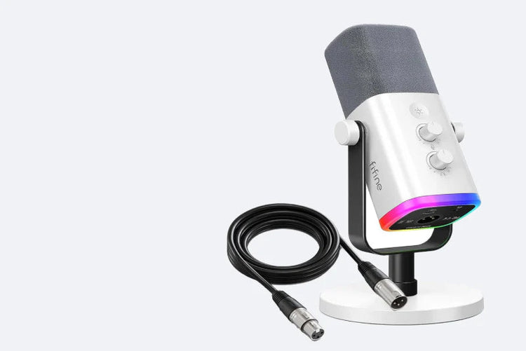 Professional white desktop gaming microphone with vibrant RGB ring lighting on a shock mount. A high-quality condenser mic designed for streaming, podcasting, and clear voice communication in a modern gaming setup.